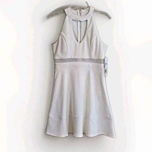 Emerald Sundae lvory Halter
Neck Flare-Skirt Sleeveless
ladies Short Dress L